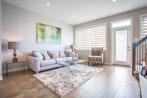 a living room with a couch and a table